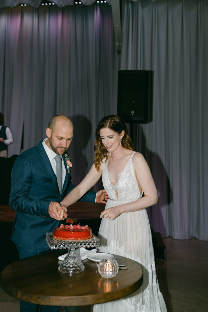 Cake cutting at a St. Louis wedding