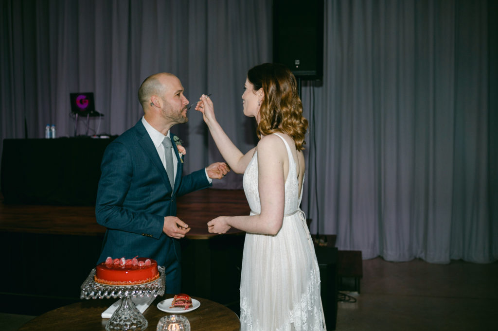 Cake cutting at a St. Louis wedding