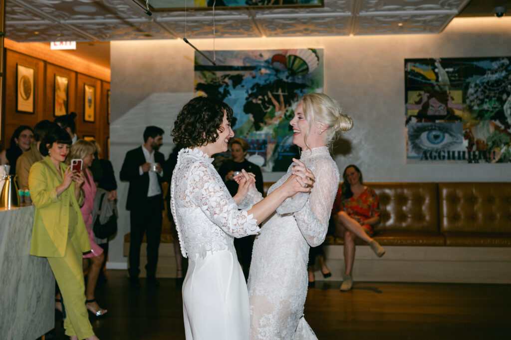 LGBTQ+ brides having their first dance