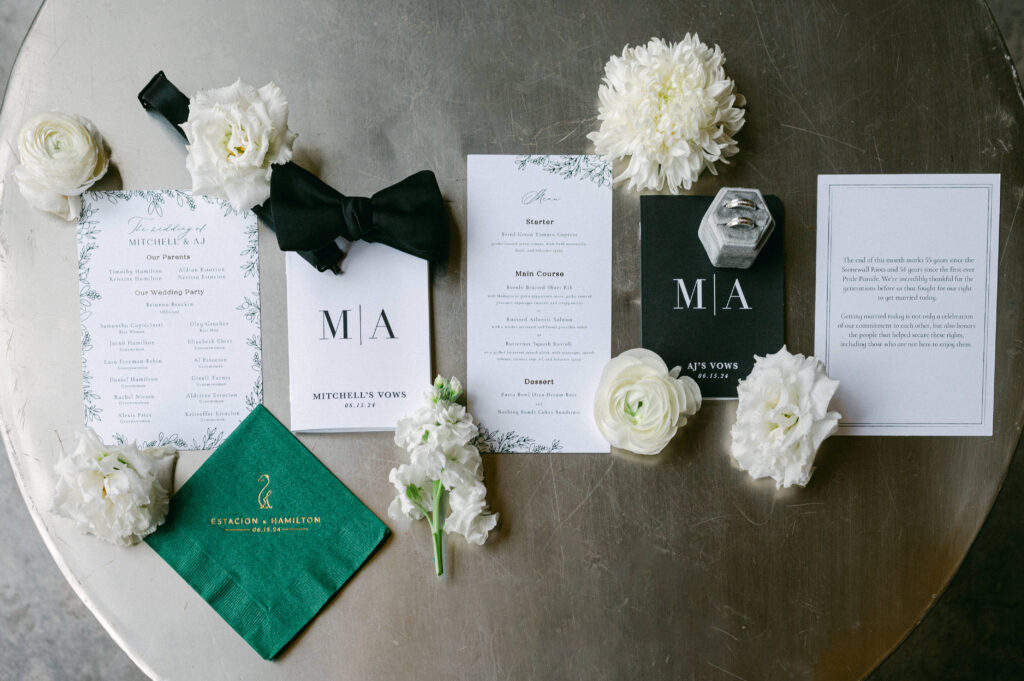 wedding flatlay for two grooms