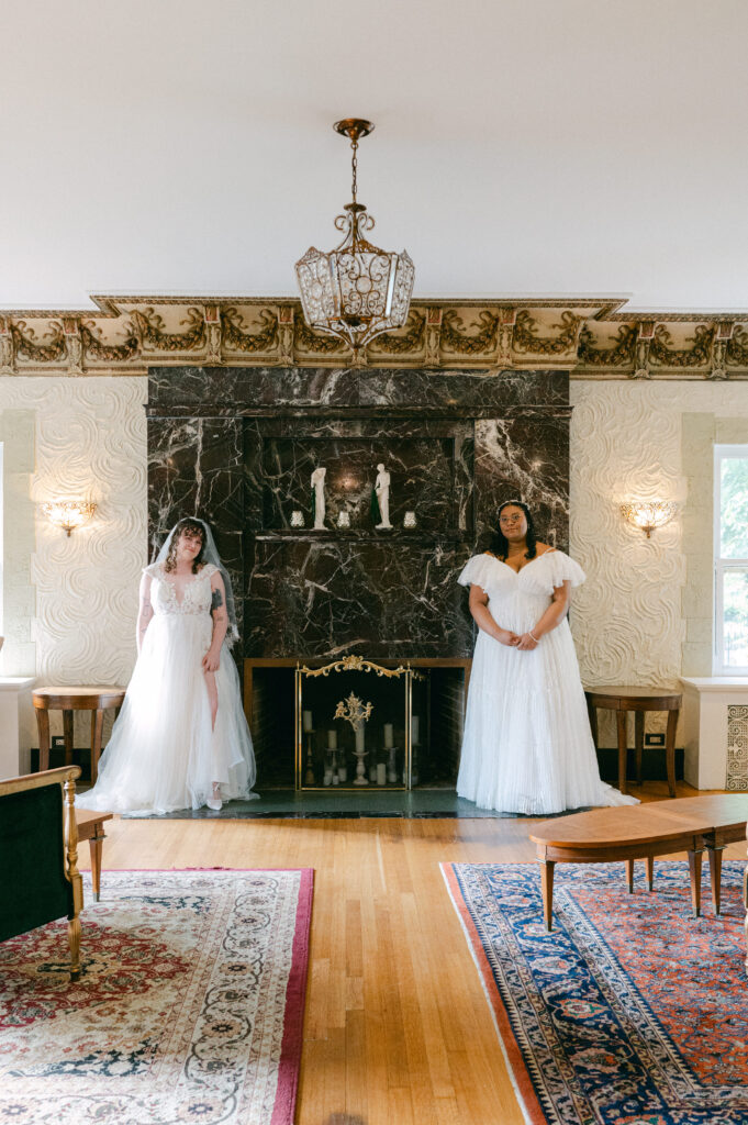 Wedding portraits in front of the marble fireplace at Colvin House, Chicago