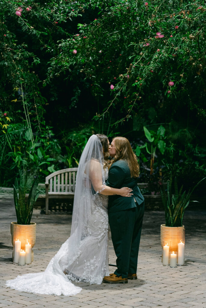 First kiss at Garfield Park Conservatory wedding ceremony